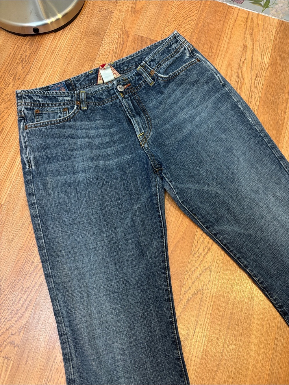 Lucky Brand Dungarees distressed blue denim mid-rise bootcut jeans. Size 10